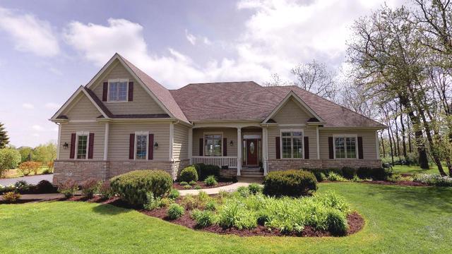 5N745 E SUNSET VIEWS Drive ST. CHARLES, Illinois Absolutely stunning home on an even more stunning 1.39 acre lot! There is much to love about this beautifully upgraded property, located just away from a playground w/partial views of 2 lakes! Be impressed by the open layout, vaulted ceilings, newly finished hardwd flrs, multiple skylights, custom trim/columns/crown moldings, recessed lighting, upgraded fixtures, & iron balusters throughout the entire home! The gourmet kitchen is every cook's dream w/granite counters, tons of cabinet & counter space, walk-in pantry, stainless steel appliances (incl. 5 burner high end cooktop), maple cabinets, & more! Open to the Family & Dining Rms for ease of entertaining, as well as right off of the most beautiful backyard oasis you'll ever see! Fully fenced inground pool w/auto cover & heater, huge patio area, & massive yard to boot! Your dreams of buying a riding mower will come true - LOL. 4-5 large bedrooms, loft area w/built in desk, full basement, & closets galore make this your new dream home!