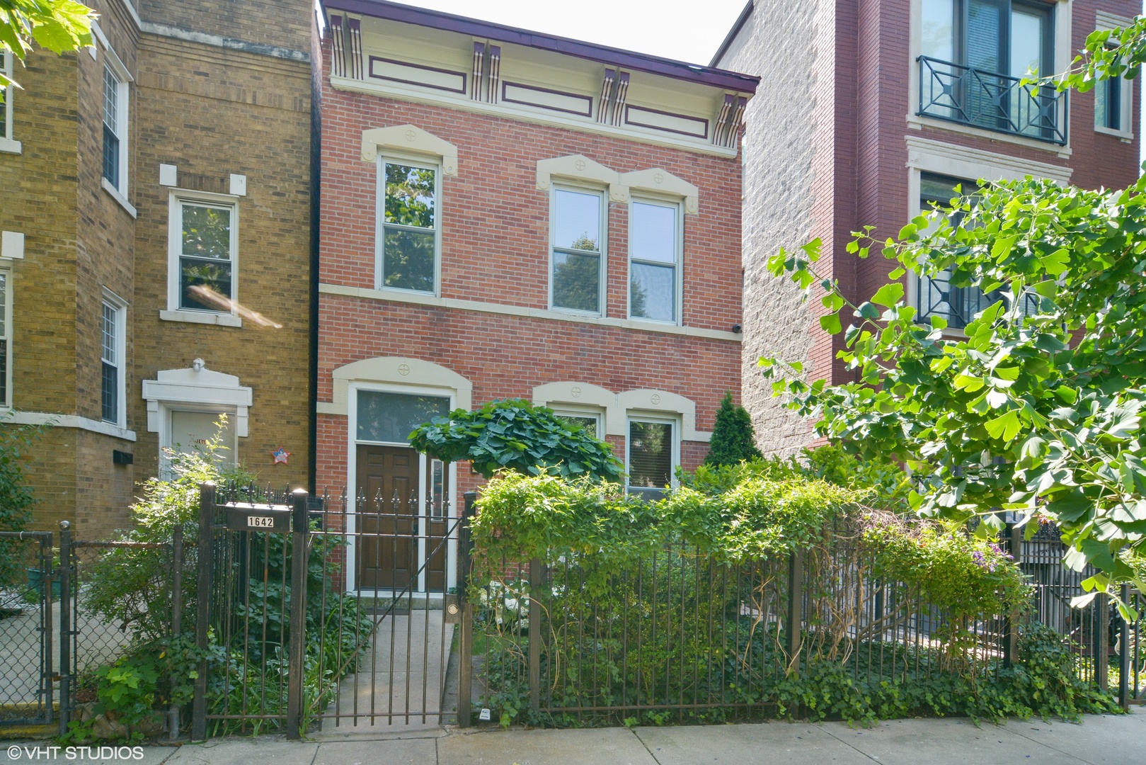 1642 Claremont Avenue N Chicago, Illinois Gorgeous 2-story, all brick home in the heart of Bucktown. This home features 3 bedrooms, exposed brick, 10 foot ceilings, large windows, fireplace, and hardwood floors throughout. The home has been impeccably maintained, including a beautifully landscaped yard with perennial garden, master bedroom with built in closet, 42" Cherry Cabinets in a kitchen that overlooks the back deck. Detached 2 car garage. The home has been freshly painted and is in move in condition. Walking distance to the Blue Line, the 606 Entrance, and vibrant North Ave / Damen intersection. Broker owned with many high end improvements over the years. Best Buy in Bucktown.