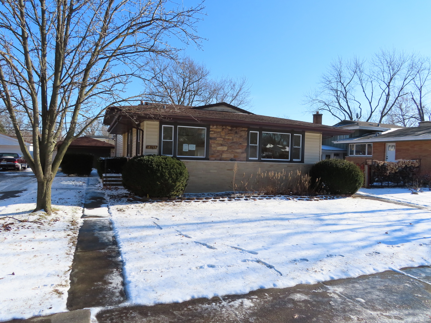 18753 Ashland Avenue HOMEWOOD, Illinois Do not wait and schedule your appointment with your real estate agent today!!! Wonderful opportunity to own solid brick & siding split level home in a need of some love!!! 2nd floor is featuring 3x good size bedrooms w/ceiling fans & 1st full bathroom w/tub. 1st floor has open living room - separate dining room & kitchen w/SS appliances & lazy Susan. Finished lower level offers family room w/wood burning fireplace - 1/2 bathroom in need of final touches & laundry/utility room w/sink/washer/dryer/boiler/hot water heater/sump pump & 100 AMPs circuit breaker box. There are hardwood floors - radiator heat - concrete patio - detached 2.5-car garage -asphalt driveway to fit additional 6 vehicles - fenced in backyard w/swing set. It is close to public transportation - PACE bus on RIEGEL ROAD & METRA train station - expressway - schools - parks - playground - dog park - Washington Park Plaza shopping Center & restaurants! Do not wait and make an offer today!!!