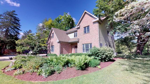 24952 W Nippersink Road ROUND LAKE, Illinois Welcome to this amazing property, surrounded by lush wooded acres & your own private creek! You'll be impressed as you come up the tree lined drive to this solid brick, massive home! Once inside, you'll love the newly finished hardwood floors, open floor plan, neutral colors, & so many updates! The Family Chef will appreciate the massive Kitchen boasting stainless steel appliances, tons of cabinet space, & a HUGE pantry! The Family Room is big enough to hold the largest of furniture, so you'll never run out of room to host parties or the Big Game. Upstairs, you'll find 2 large bedrooms & a walk-in attic space perfect for storage or easily converted to a bedroom. The Master is the perfect spot to unwind after a long day, w/ a spa- like bath & enormous closet. Full, finished basement w/ extra storage space! This home sits on over 3 acres w/ beautiful flowers & a large deck overlooking your private creek! Separate garage holds 4 addt'l cars & space for a workshop. Fall in love today!