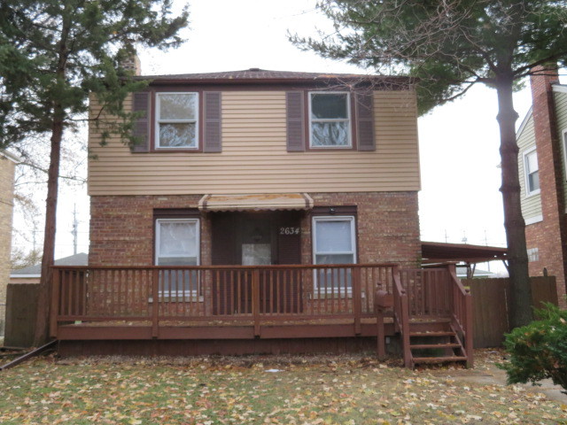 2634 Willow Street FRANKLIN PARK, Illinois Cozy 2-story brick Georgian home located on oversize lot is waiting for you to call it a home!!! No neighbors at rear - front porch - concrete patio - garage - extra concrete slab at rear for additional vehicle parking - storage shed & good size fenced in backyard waiting for those summer barbecue days!!! 2nd floor is featuring 2 bedrooms - newer full bathroom w/tub....nice size 1st bedroom with deep closet. 1st floor is featuring open living room w/built in shelves & coat closet - separate dining room - newer fully appliance galley kitchen w/plenty of cabinet space/double sink/granite counter tops & view at the backyard. Full finished basement has family room & laundry/utility room with laundry sink/washer/dryer and tons of storage! There are hardwood floors thru-out 1st & 2nd floors - wood laminate floors in basement - new paint and blinds thru-out! It is close to public transportation - PACE bus on GRAND AVENUE & METRA train station is not too far away either - expressway - parks - trails - schools - stores - shopping & restaurants!!! Come to see today...you will not be disappointed!!! Do not wait and make an offer today!!!